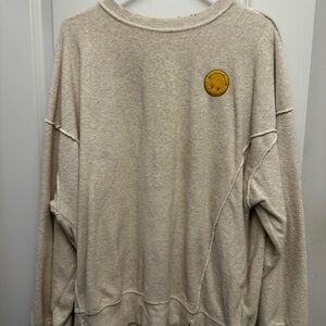 Aerie women’s  Beige Crewneck Sweater with Yellow Patch